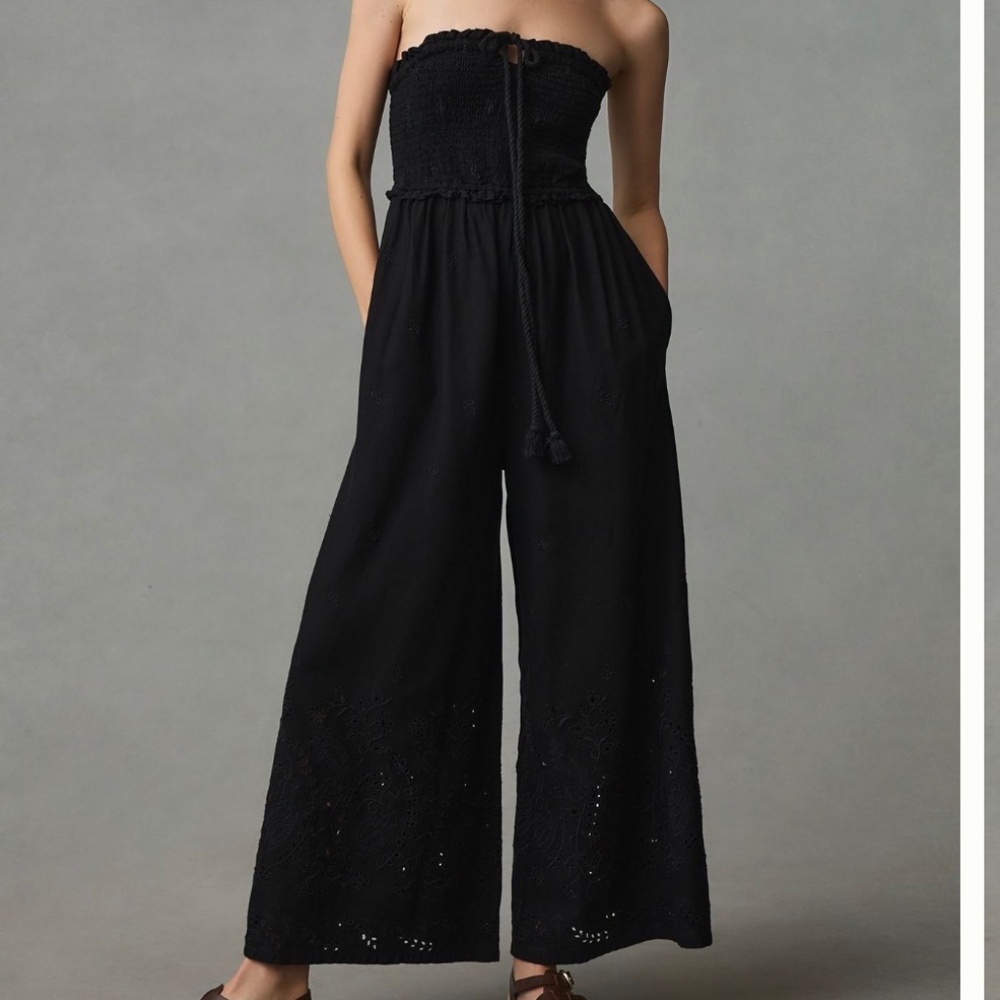 By Anthropologie black strapless eyelet jumpsuit sz M